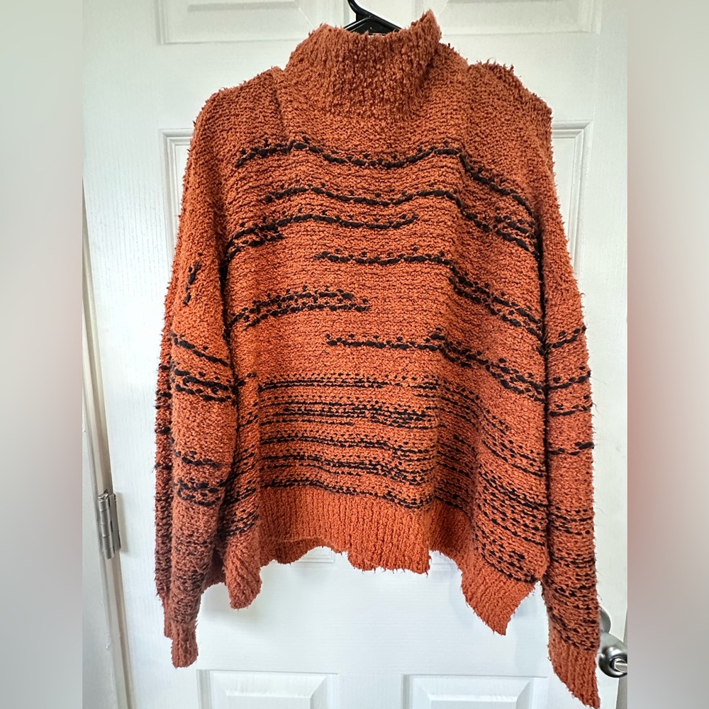 Orange turtleneck